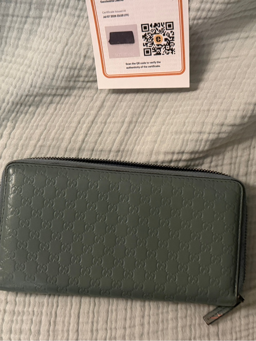 Gucci light blue gray Guccisima Embossed GG Zip Around Wallet With COA